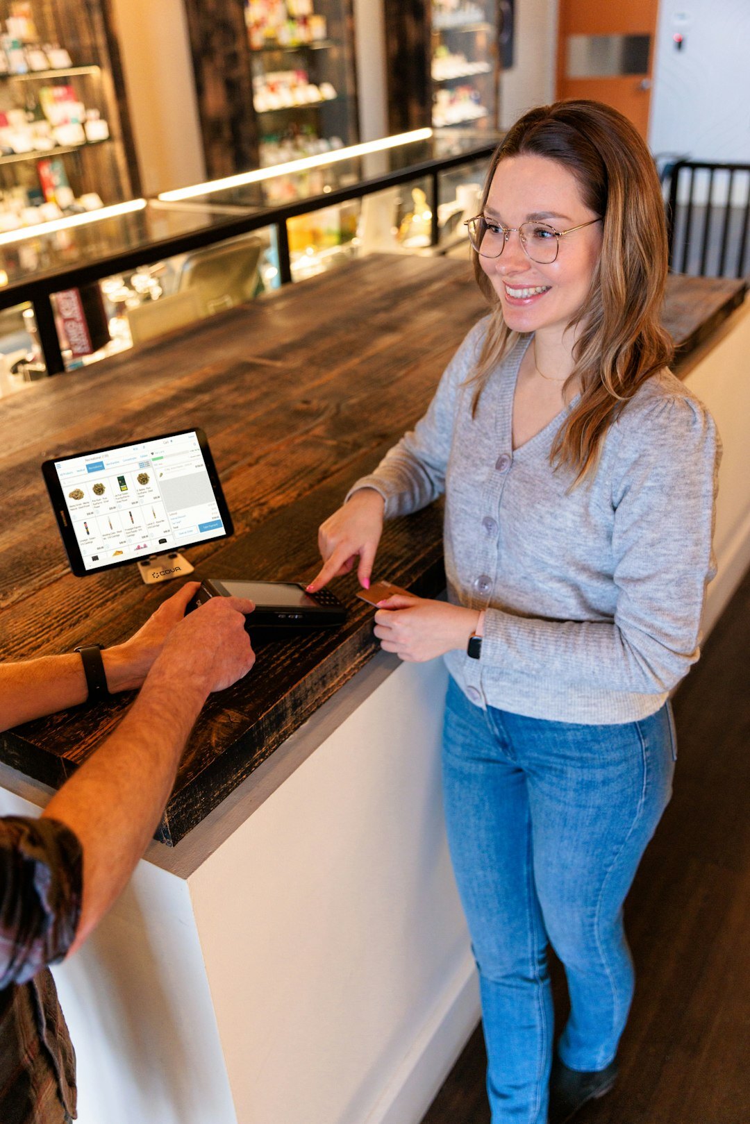 sales assistant helping customer